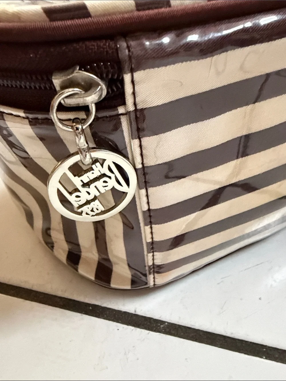 henri bendel Brown and White Striped Cosmetic Case